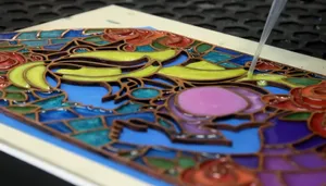 A stained glass design made via laser cutting and resin pouring.